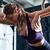 exhausted-woman-training-on-gymnastic-rings-RQX4PVZ-min.jpg